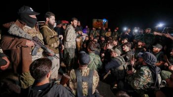 Syrian security forces and Druze gunman deploy in a Damascus suburb