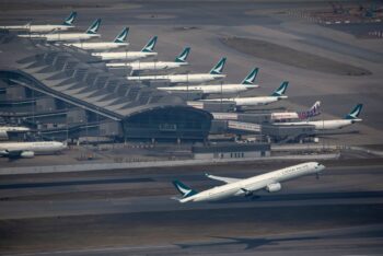 Newsdeck: Cargo plane slides off runway in Hong Kong, media reports two dead