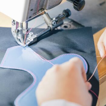 Lorenzo Bertelli and Andrea Guerra on Prada’s Manufacturing History and Welcoming Versace into the Fold