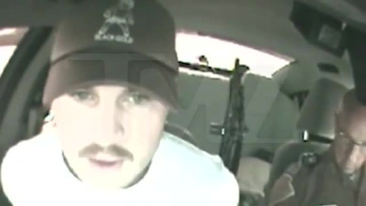 The couple’s three small children were reportedly inside the car.